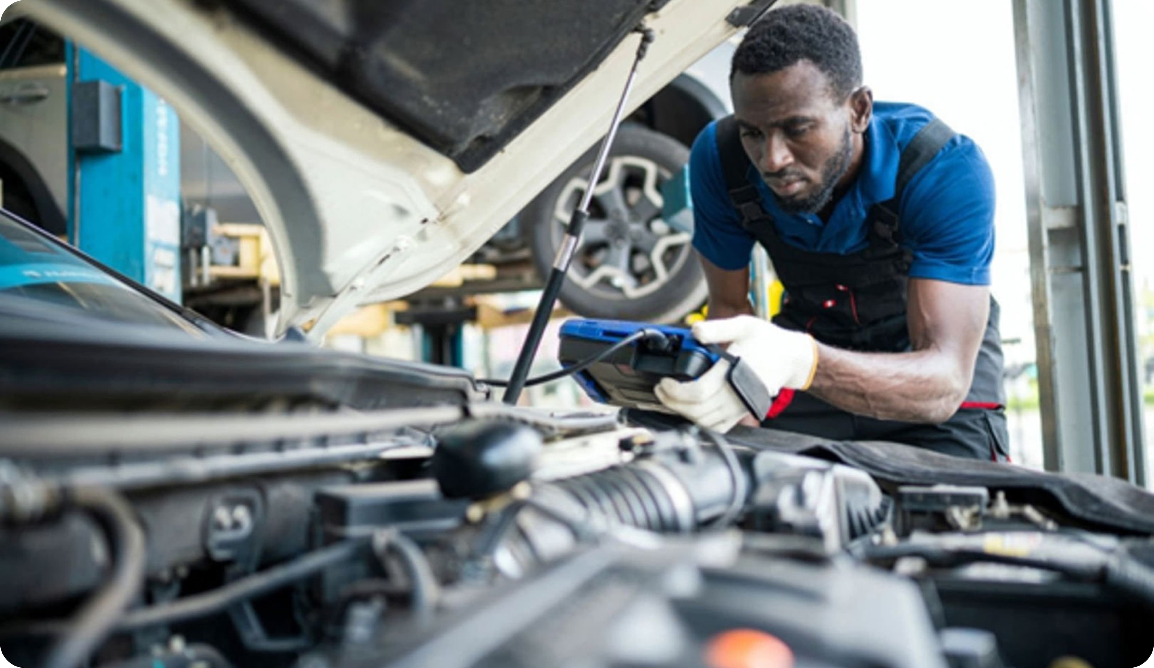 Mechanic working on a car